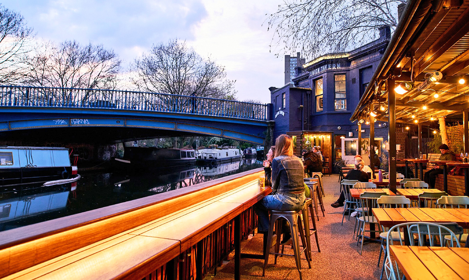 A view of the outside terrace at The Union Tavern at dusk